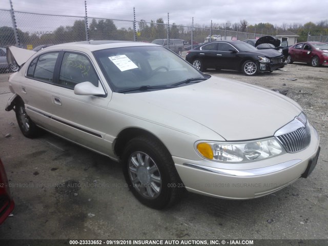 1LNHM97V22Y682036 - 2002 LINCOLN CONTINENTAL  GOLD photo 1