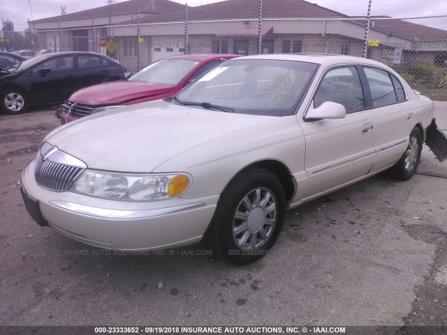 1LNHM97V22Y682036 - 2002 LINCOLN CONTINENTAL  GOLD photo 2