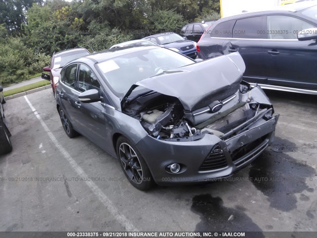 1FAHP3N24CL200091 - 2012 FORD FOCUS TITANIUM SILVER photo 1