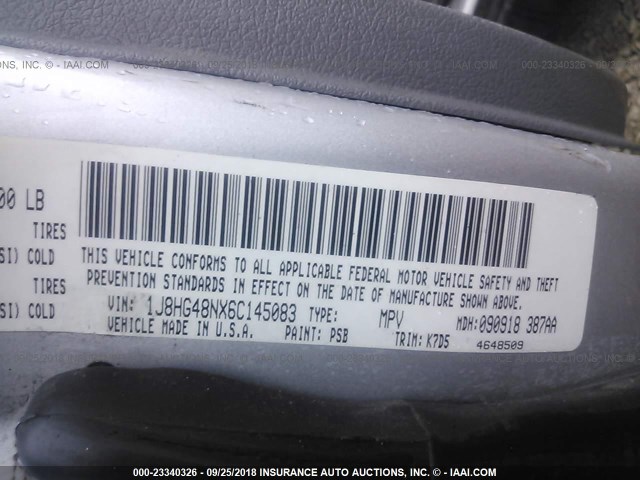 1J8HG48NX6C145083 - 2006 JEEP COMMANDER SILVER photo 9