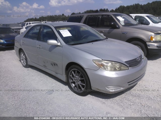 4T1BE32KX3U197939 - 2003 TOYOTA CAMRY LE/XLE/SE Күміс фото 1