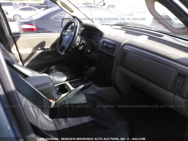 1J4GW48NX4C280979 - 2004 JEEP GRAND CHEROKEE LAREDO/COLUMBIA/FREEDOM BLUE photo 5
