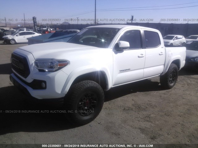 3TMAZ5CN2HM040569 - 2017 TOYOTA TACOMA DBL CAB/SR5/TRD SPORT/OR WHITE photo 2