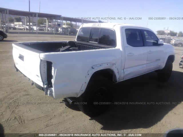 3TMAZ5CN2HM040569 - 2017 TOYOTA TACOMA DBL CAB/SR5/TRD SPORT/OR WHITE photo 4