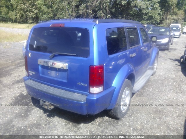 1D8GU58K57W639473 - 2007 DODGE NITRO SLT BLUE photo 4