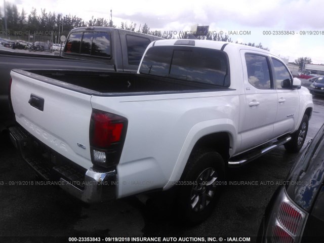 5TFAZ5CN8JX055027 - 2018 TOYOTA TACOMA DBL CAB/SR5/TRD SPORT/OR WHITE photo 4