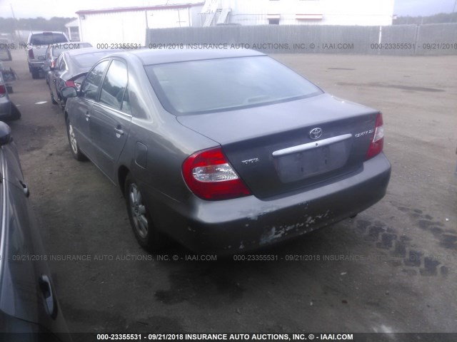 4T1BE30KX3U769580 - 2003 TOYOTA CAMRY LE/XLE/SE Сұр фото 3