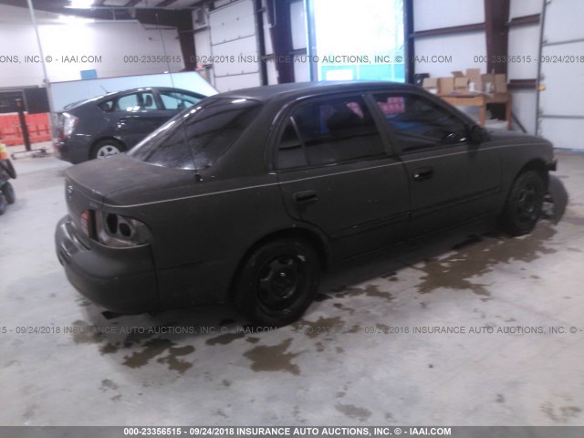 1Y1SK5289YZ428476 - 2000 CHEVROLET GEO PRIZM LSI შავი ფოტო 4