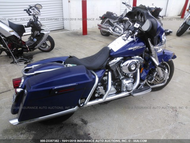 1HD1KBW106Y693686 - 2006 HARLEY-DAVIDSON FLHXI BLUE photo 4