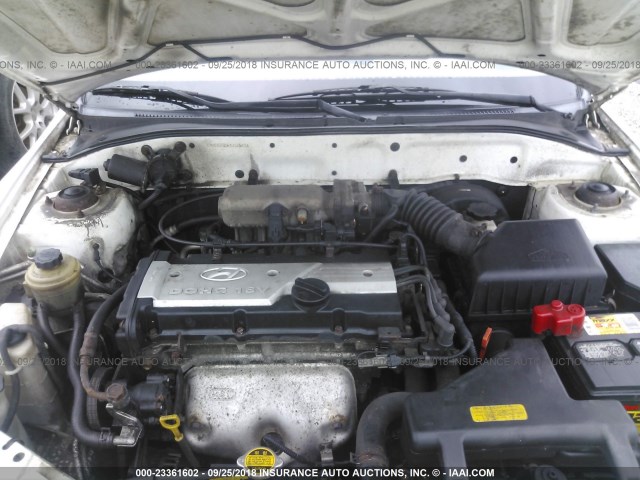 KMHCG35C61U146454 - 2001 HYUNDAI ACCENT WHITE photo 10