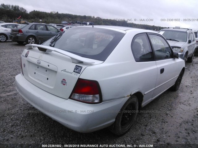 KMHCG35C61U146454 - 2001 HYUNDAI ACCENT WHITE photo 4