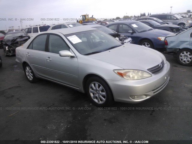 JTDBE30K230143808 - 2003 TOYOTA CAMRY LE/XLE Күміс фото 1