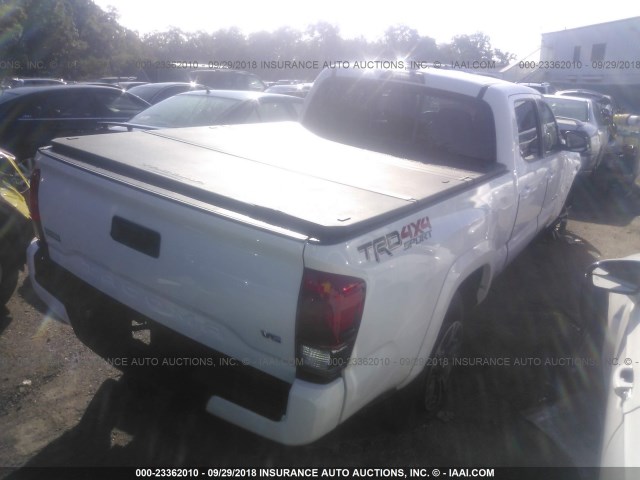 5TFDZ5BN4GX008312 - 2016 TOYOTA TACOMA DBL CAB/SR5/TRD SPORT/OR WHITE photo 4