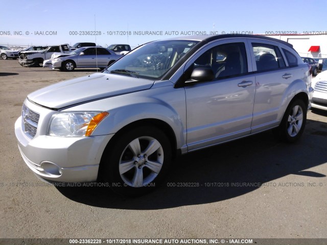 1B3CB3HA4BD209292 - 2011 DODGE CALIBER MAINSTREET SILVER photo 2