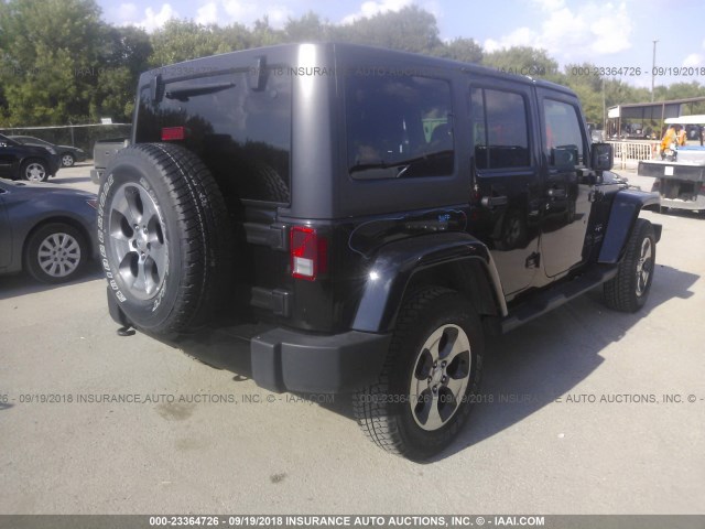 1C4HJWEG5HL753915 - 2017 JEEP WRANGLER UNLIMITE SAHARA BLACK photo 4