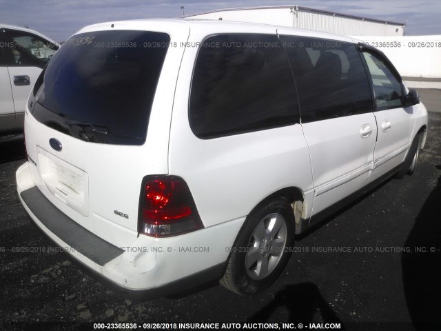 2FMZA57614BA77391 - 2004 FORD FREESTAR SES WHITE photo 4