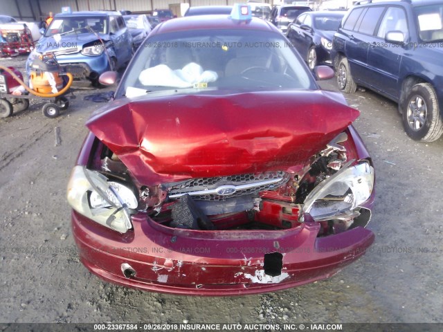1FAFP55221A259622 - 2001 FORD TAURUS SES RED photo 6