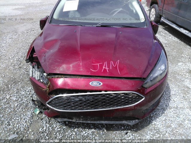 1FADP3M26HL298063 - 2017 FORD FOCUS SEL RED photo 10