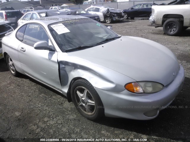 KMHJG34F3XU150599 - 1999 HYUNDAI TIBURON FX SILVER photo 1