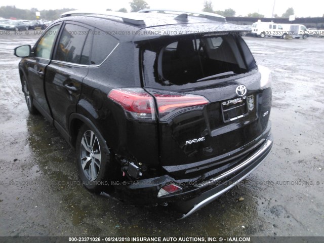 2T3WFREV7JW479404 - 2018 TOYOTA RAV4 ADVENTURE/XLE BLACK photo 6