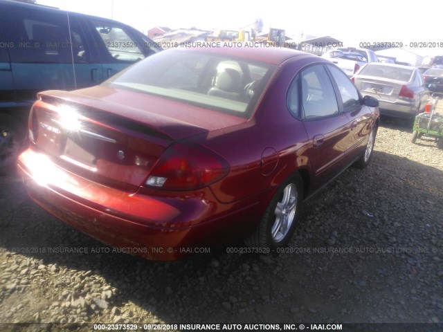 1FAFP56S1YG272321 - 2000 FORD TAURUS SEL RED photo 4