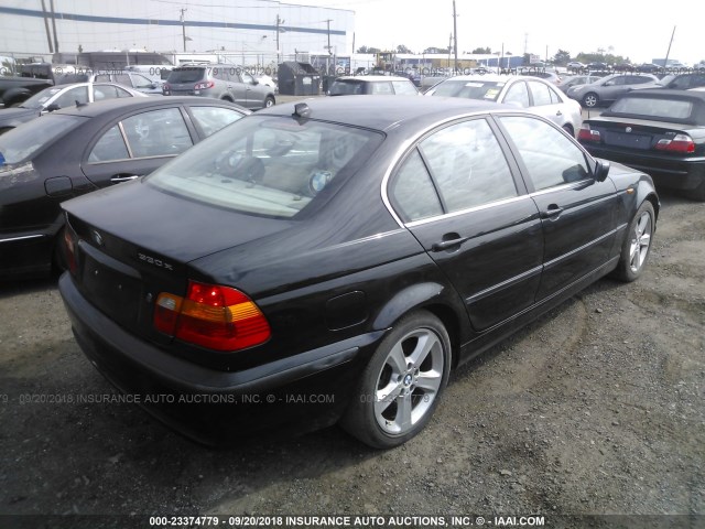 WBAEW53445PN38633 - 2005 BMW 330 XI BLACK photo 4