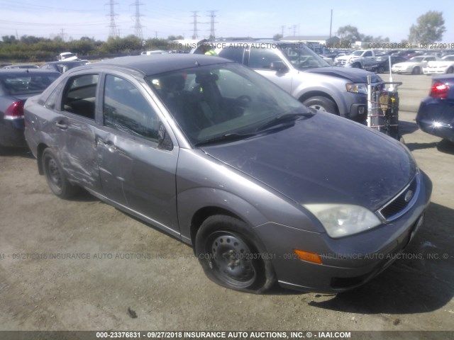 1FAHP34N67W180958 - 2007 FORD FOCUS ZX4/S/SE/SES GRAY photo 1