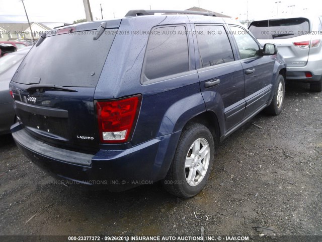 1J4GR48K75C697099 - 2005 JEEP GRAND CHEROKEE LAREDO/COLUMBIA/FREEDOM BLUE photo 4