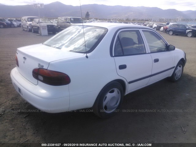 1Y1SK528X1Z413524 - 2001 CHEVROLET GEO PRIZM LSI WHITE photo 4