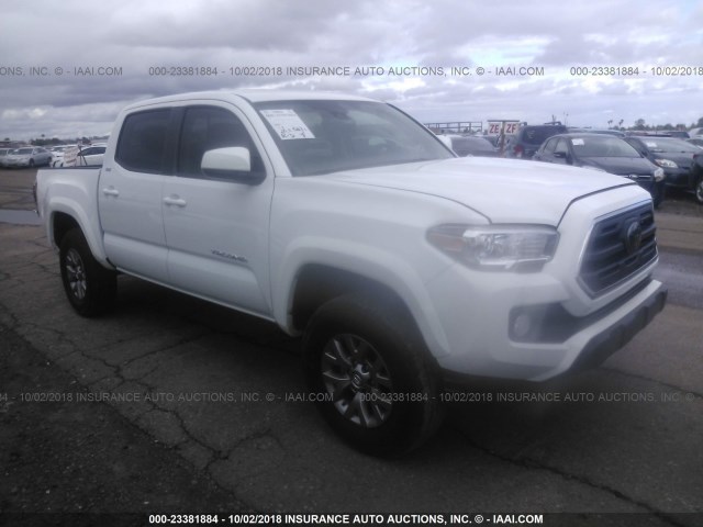 3TMAZ5CN9JM057973 - 2018 TOYOTA TACOMA DBL CAB/SR5/TRD SPORT/OR WHITE photo 1