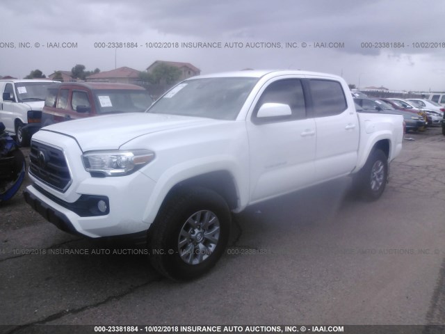 3TMAZ5CN9JM057973 - 2018 TOYOTA TACOMA DBL CAB/SR5/TRD SPORT/OR WHITE photo 2