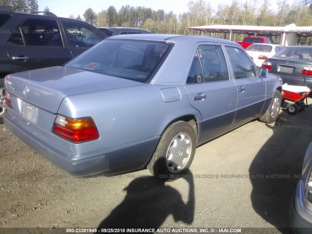 WDBEA34E7NB823450 - 1992 MERCEDES-BENZ 400 E Light Blue photo 4