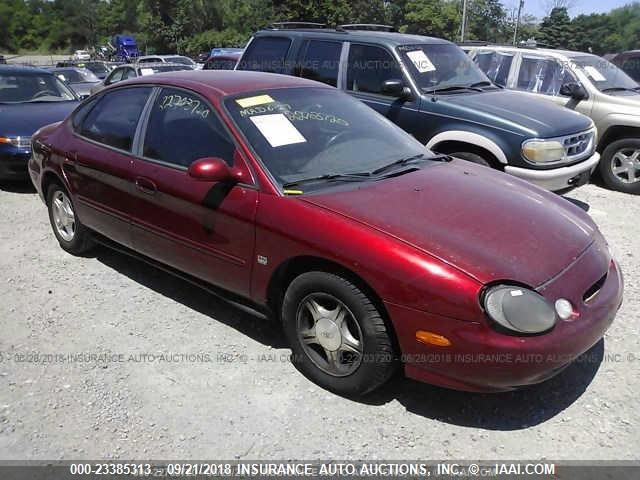 1FAFP53S1XG182122 - 1999 FORD TAURUS SE/COMFORT/SPORT RED photo 1