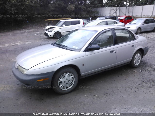 1G8ZG5285XZ364238 - 1999 SATURN SL1 SILVER photo 2