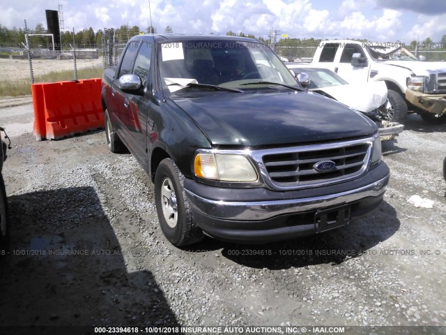 1FTRW07L51KA32986 - 2001 FORD F150 SUPERCREW GREEN photo 1