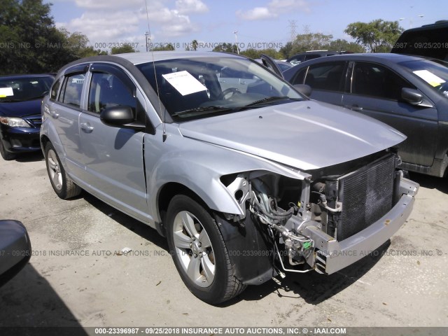 1B3CB3HA3BD107773 - 2011 DODGE CALIBER MAINSTREET SILVER photo 1