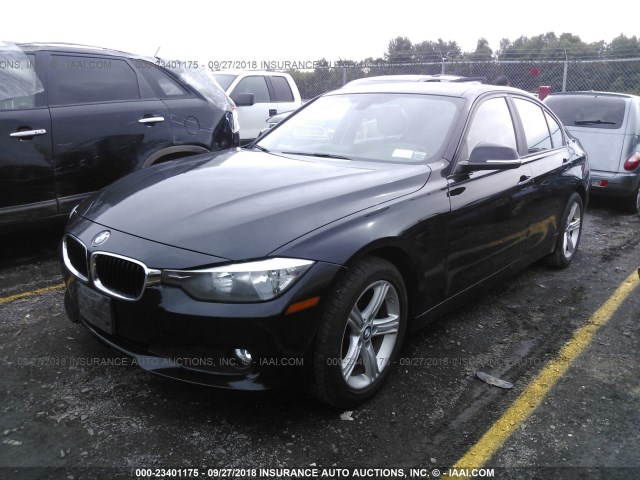 WBA3C3C53DF981311 - 2013 BMW 320 I/XDRIVE Schwarz Foto 2