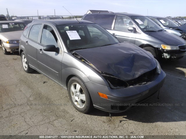 1FAHP37N67W331583 - 2007 FORD FOCUS ZX5/S/SE/SES GRAY photo 1