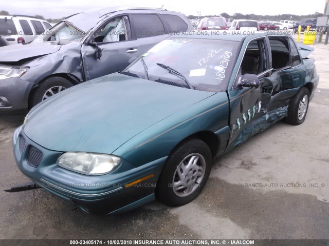 1G2NE52T0VC738984 - 1997 PONTIAC GRAND AM SE GREEN photo 6