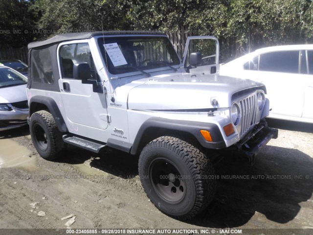 1J4FA49S44P734473 - 2004 JEEP WRANGLER / TJ SPORT SILVER photo 1