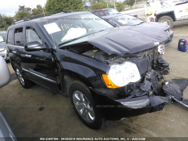 1J8HR68268C101256 - 2008 JEEP GRAND CHEROKEE OVERLAND BLACK photo 1