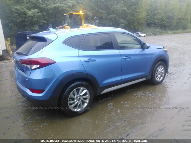 KM8J3CA47JU718553 - 2018 HYUNDAI TUCSON BLUE photo 4