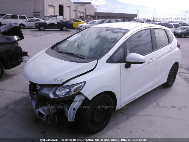 JHMGK5H5XGX006927 - 2016 HONDA FIT LX WHITE photo 2