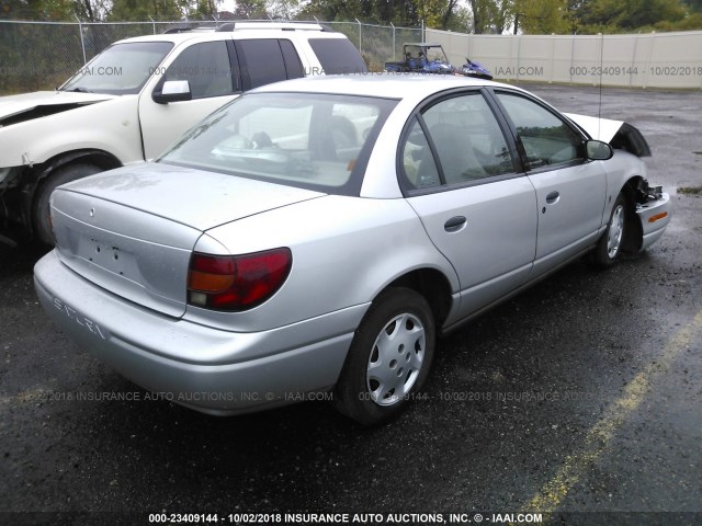 1G8ZH52842Z163517 - 2002 SATURN SL1 SILVER photo 4