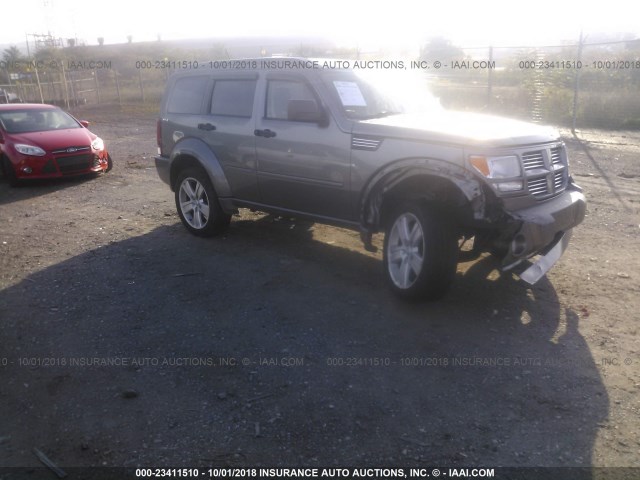 1D4PU4GX9BW607191 - 2011 DODGE NITRO HEAT GRAY photo 1