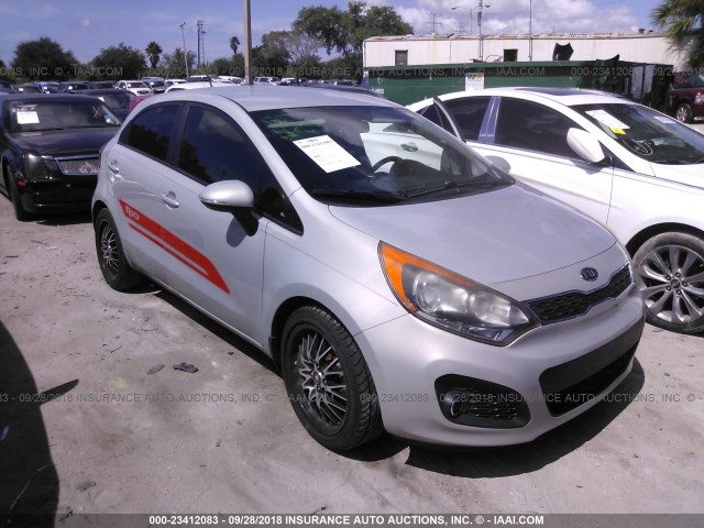 KNADN5A38D6101957 - 2013 KIA RIO EX/SX TAN photo 1