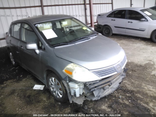 3N1BC13E77L371766 - 2007 NISSAN VERSA S/SL GRAY photo 1