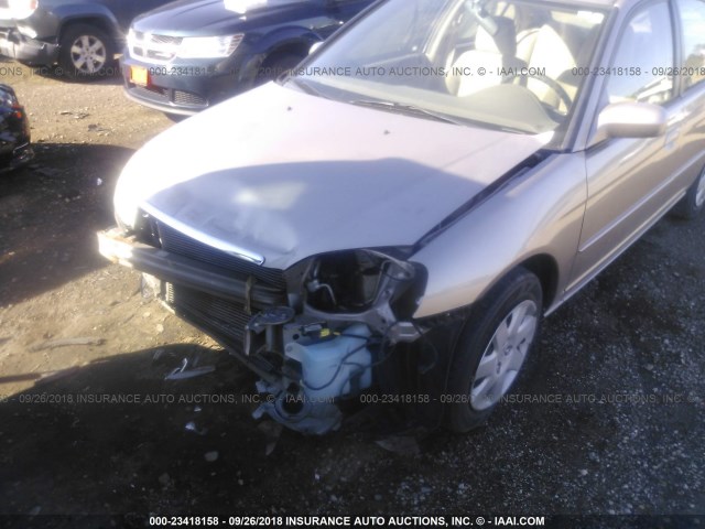 1HGES26791L017655 - 2001 HONDA CIVIC EX GOLD photo 6