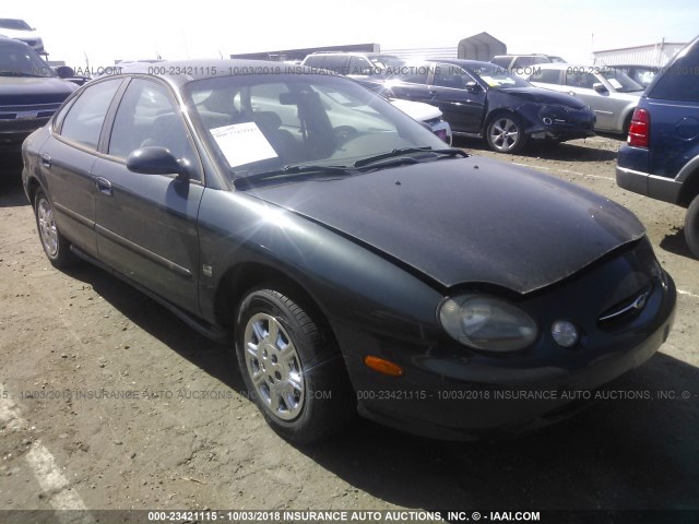 1FAFP52S9WA136458 - 1998 FORD TAURUS LX/SE GREEN photo 1