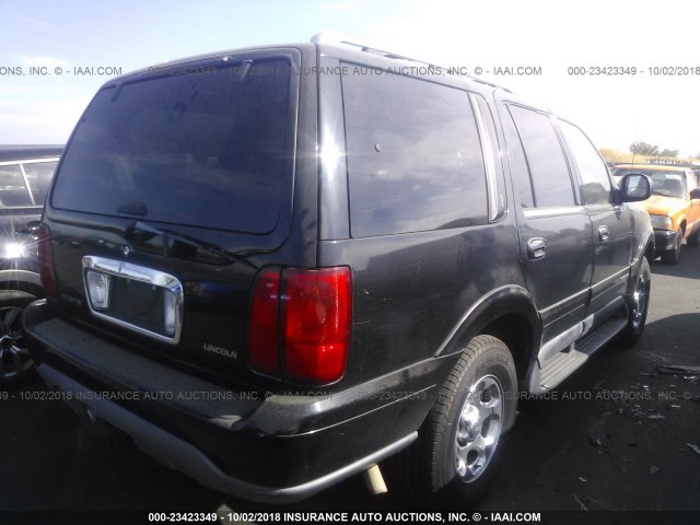 5LMPU28L1WLJ35209 - 1998 LINCOLN NAVIGATOR BLACK photo 4